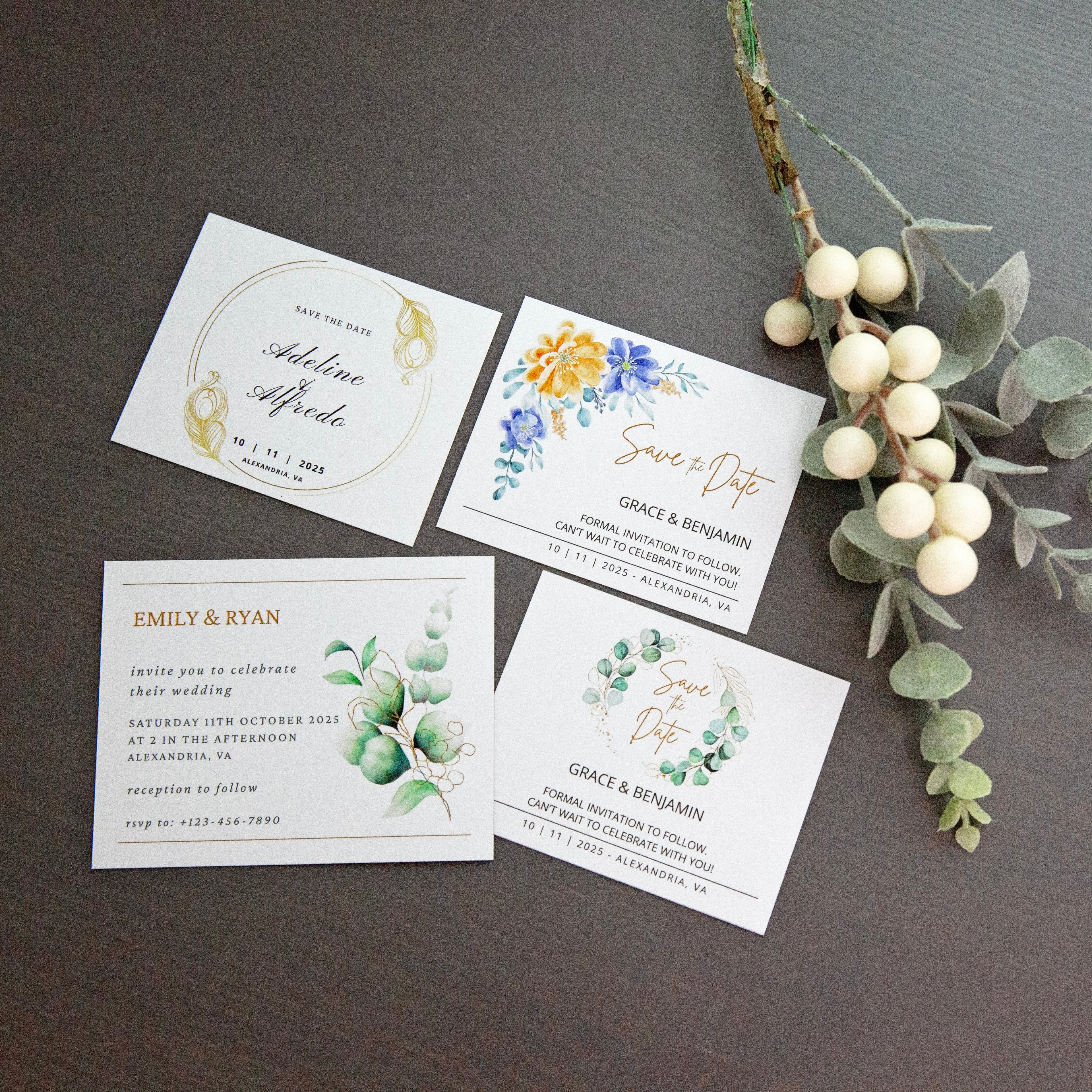 Set of wedding invitations with floral designs on a dark surface.